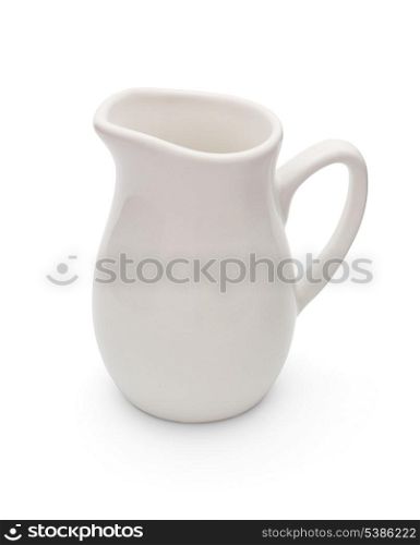 Porcelain milk jug isolated on white