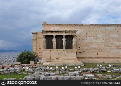 Porch of the Caryatids exterior view of Erechtheion ancient temple ruins at the Acropolis, Athens Greece.