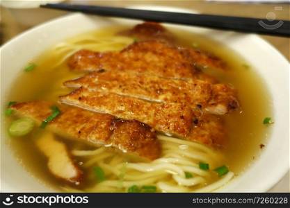 Pork chops with noodle soup. Chinese food.