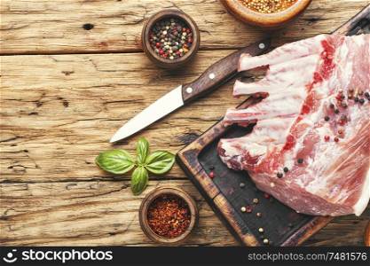 Pork meat on chopping board ready for cooking. Pork chops on a cutting board