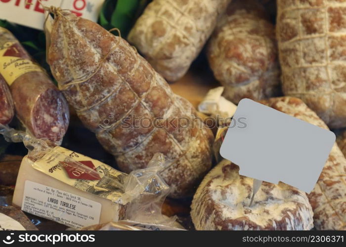 pork products salami and ardo. various pork sausages displayed in the showcase