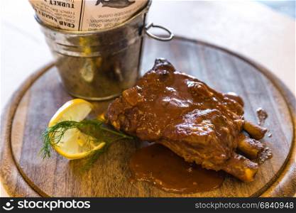 Pork Rib with Fries on wooden plate