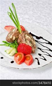 Pork rolls with cheese and vegetables: onion, cucumbers, tomatoes
