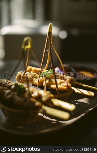 Pork satay ,Grilled pork served with peanut sauce or sweet and sour sauce ,Asian food style 