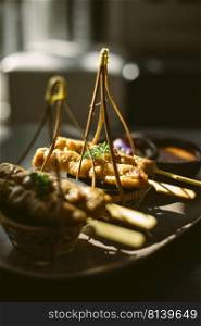 Pork satay ,Grilled pork served with peanut sauce or sweet and sour sauce ,Asian food style 