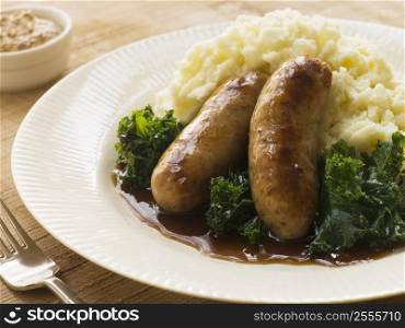 Pork Sausage and Mash with Curly Kale