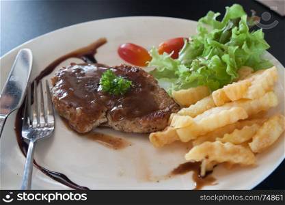 Pork steak on plate