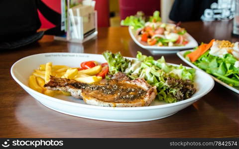 Pork steak with black chilli pepper