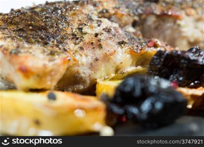 Pork tenderloin with roasted potatoes and plums