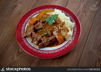 Porkolt - Porkolt,meat stew which originates from Hungary, but is eaten throughout Central Europe and the Balkans.