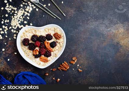 porridge with Chia and oat flakes in bowl