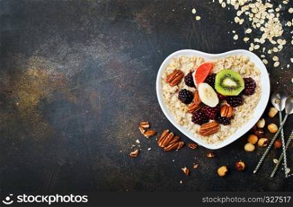porridge with Chia and oat flakes in bowl