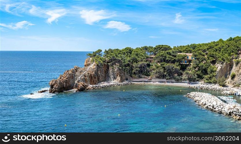 Port and pebble beach of Calanques of Figuieres, creek of Figuieres and Figuieres Cove in Mejean during summer, South of France, Europe. Calanque de Figuieres, South of France