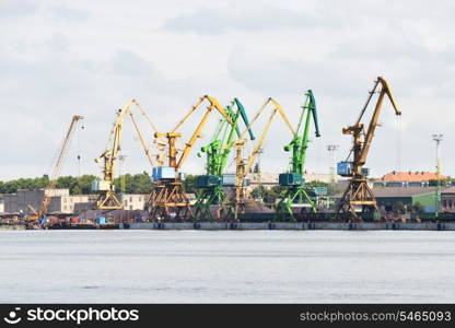 port cranes lowered the boom in port