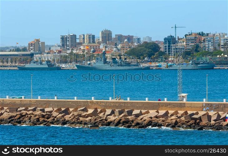 Port in Cartagena bay. Summer coast view with ships (Costa Blanca, Spain). All people are unrecognized.