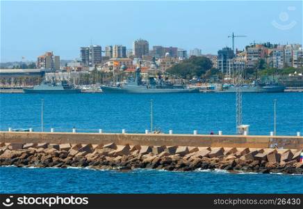 Port in Cartagena bay. Summer coast view with ships (Costa Blanca, Spain). All people are unrecognized.