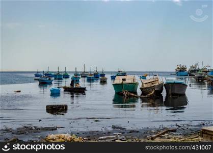 Port of fishing boats in the old marina of the city of Hurghada in Egypt. Port of fishing boats