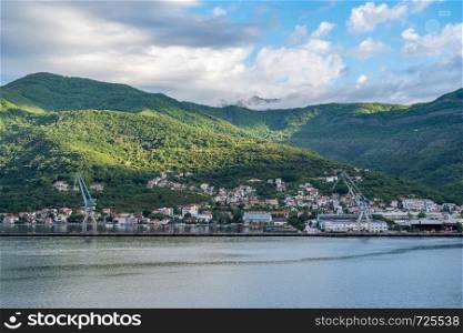 Port town of Bijela on coastline of Gulf of Kotor in Montenegro. Cruise up the Bay of Kotor in Montenegro