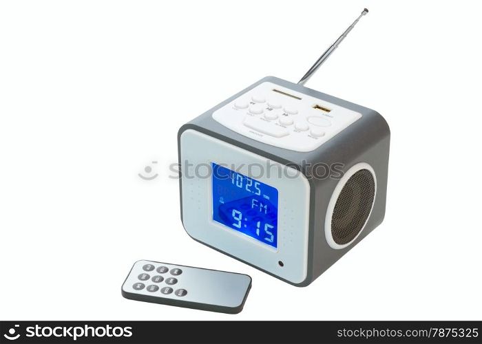 Portable radio receiver with alarm, card-reader, amplifier, remote control and MP3 player isolated on a white background