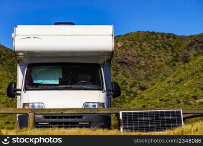 Portable solar photovoltaic panel, charging battery at c&er car rv. Solar photovoltaic panel at caravan