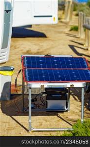 Portable solar photovoltaic panel, charging battery at c&er car rv. C&ing equipment. Solar photovoltaic panel at c&er caravan