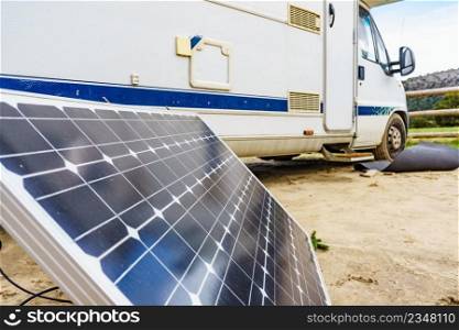 Portable solar photovoltaic panel, charging battery at c&er vehicle.. Solar photovoltaic panel at c&er vehicle
