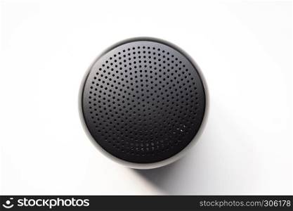 Portable Wireless Speaker, Isolated on White Background, Showing Dotted Metal Grille