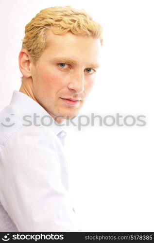 Portait of a serious confident businessman on isolated background