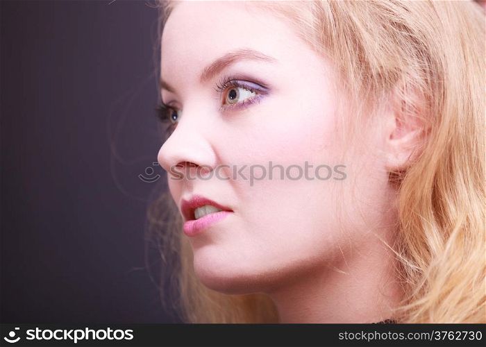 Portait of beautiful blond girl. Closeup of face attractive young woman. Beauty.