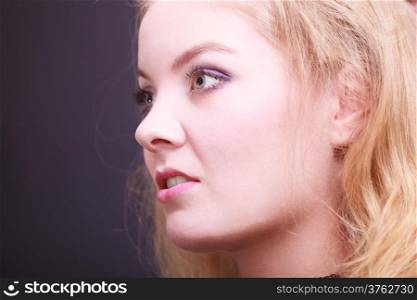 Portait of beautiful blond girl. Closeup of face attractive young woman. Beauty.