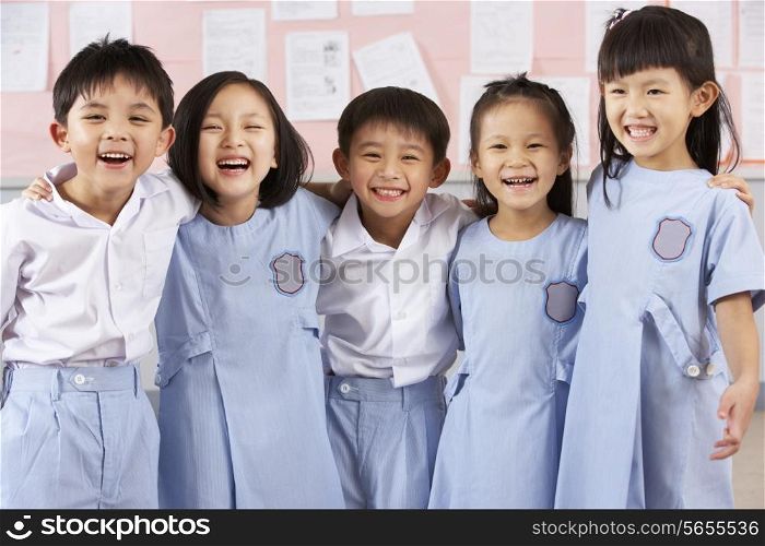 Portait Of Students In Chinese School Classroom