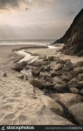 Porthcurno yellow sand beach before sunset Cornwall England