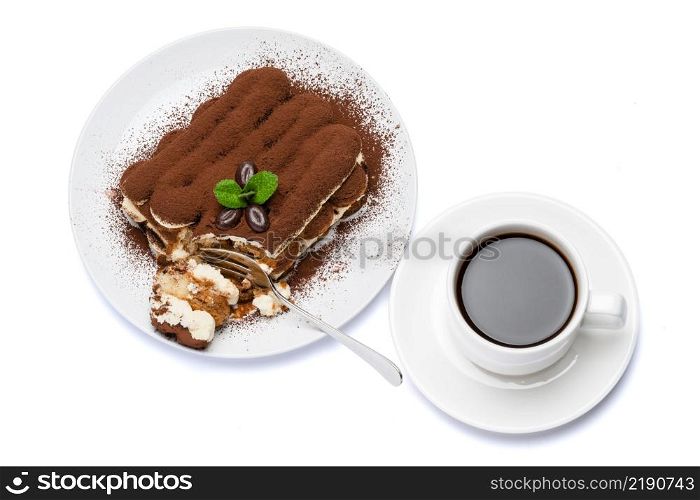 portion of Classic tiramisu dessert and cup of fresh espresso coffee isolated on white background with clipping path embedded. portion of Classic tiramisu dessert and cup of fresh espresso coffee isolated on white background with clipping path