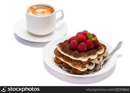 portion of Classic tiramisu dessert with raspberries and cup of fresh hot espresso isolated on white background - clipping path embedded. portion of Classic tiramisu dessert with raspberries and cup of fresh hot espresso isolated on white background - clipping path