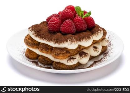 portion of Classic tiramisu dessert with raspberries on ceramic plate isolated on white background - clipping path embedded. portion of Classic tiramisu dessert with raspberries on ceramic plate isolated on white background - clipping path