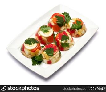Portion of delicious chicken aspic on a plate isolated on white background. High quality photo. Portion of delicious chicken aspic on a plate isolated on white background