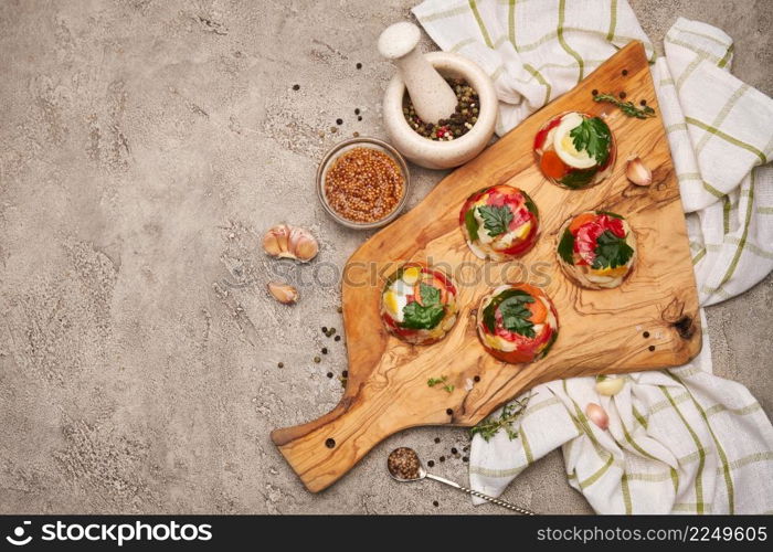 Portion of delicious chicken aspic on serving board on concrete table. High quality photo. Portion of delicious chicken aspic on serving board on concrete table