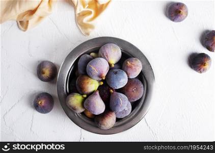 Portion of fresh Figs on light background