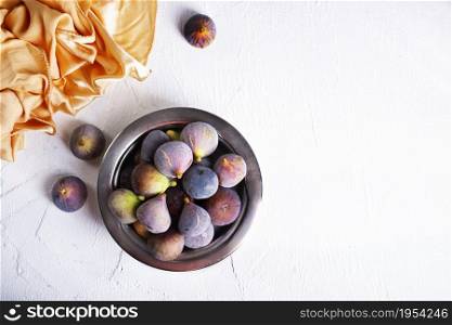 Portion of fresh Figs on light background