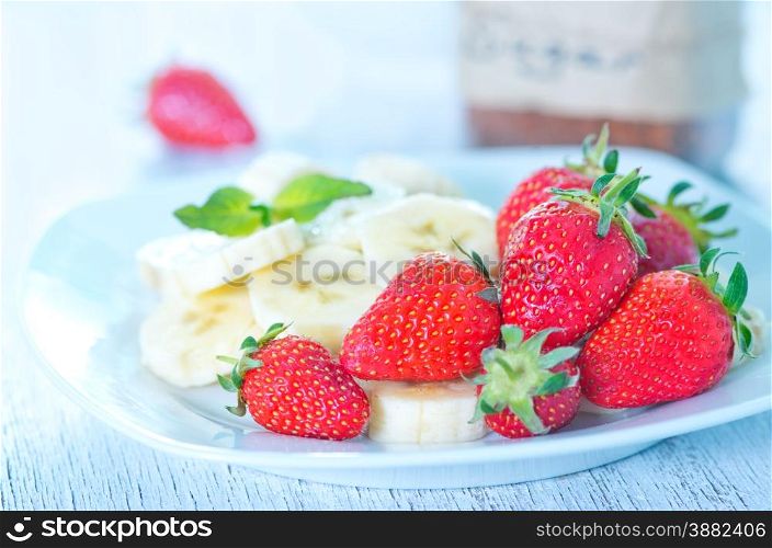 portion of fresh strawberry and fresh banana