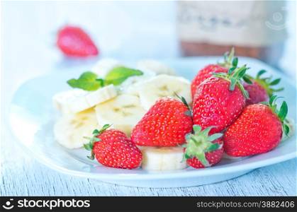 portion of fresh strawberry and fresh banana
