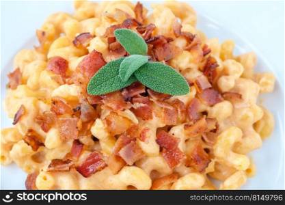 Portion of macaroni and cheese with bacon topping