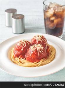 Portion of meatballs with tomato sauce and pasta