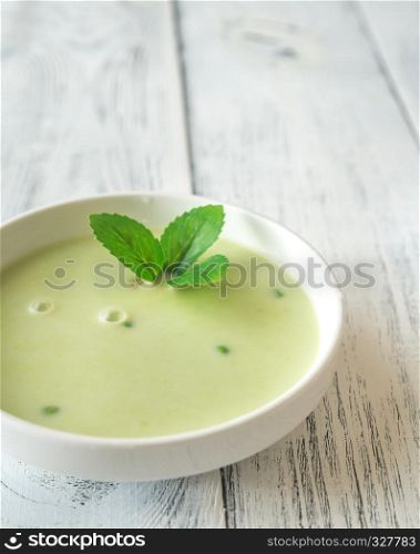 Portion of pea cream soup