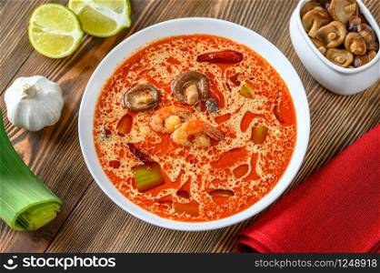 Portion of Tom Yum - famous Thai soup with ingredients