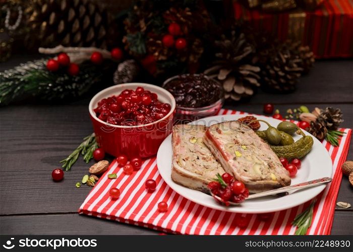 Portion of Traditional French terrine covered with bacon and decorated Christmas tree. High quality photo. Portion of Traditional French terrine covered with bacon and decorated Christmas tree