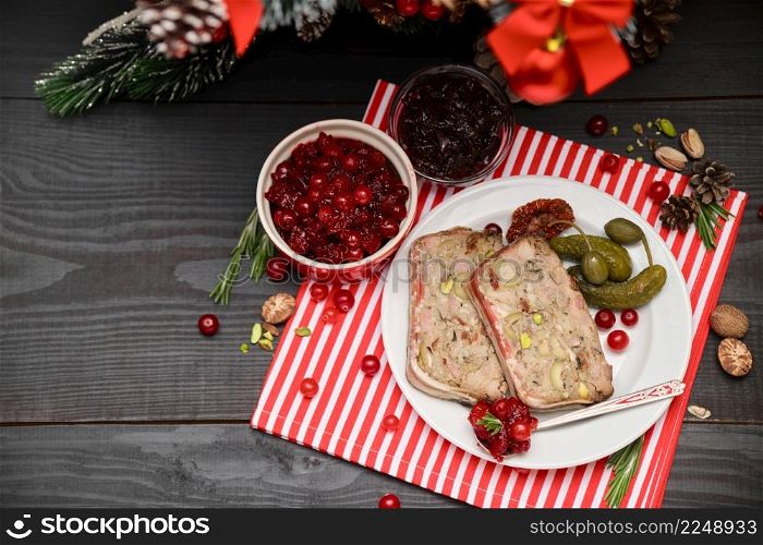 Portion of Traditional French terrine covered with bacon and decorated Christmas tree. High quality photo. Portion of Traditional French terrine covered with bacon and decorated Christmas tree