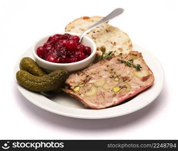 Portion of Traditional French terrine covered with bacon isolated on white background. High quality photo. Portion of Traditional French terrine covered with bacon isolated on white background