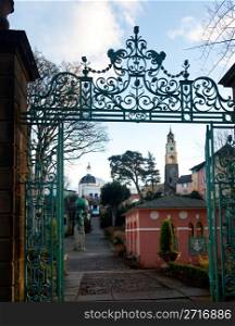 Portmerion village on the North coast of Wales in winter showing the fantasy houses through the ornate gates