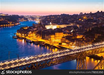 Porto Cityscape Portugal at dusk with Dom Luiz bridge